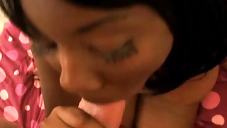 Chesty young black girlfriend Sweet Essence giving blowjob to her white boyfriend